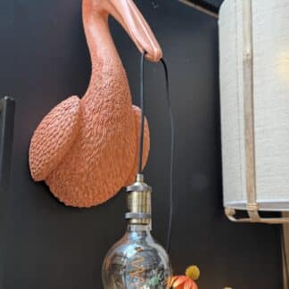 Wandlamp Pelikaan coral , 63 cm hoog.